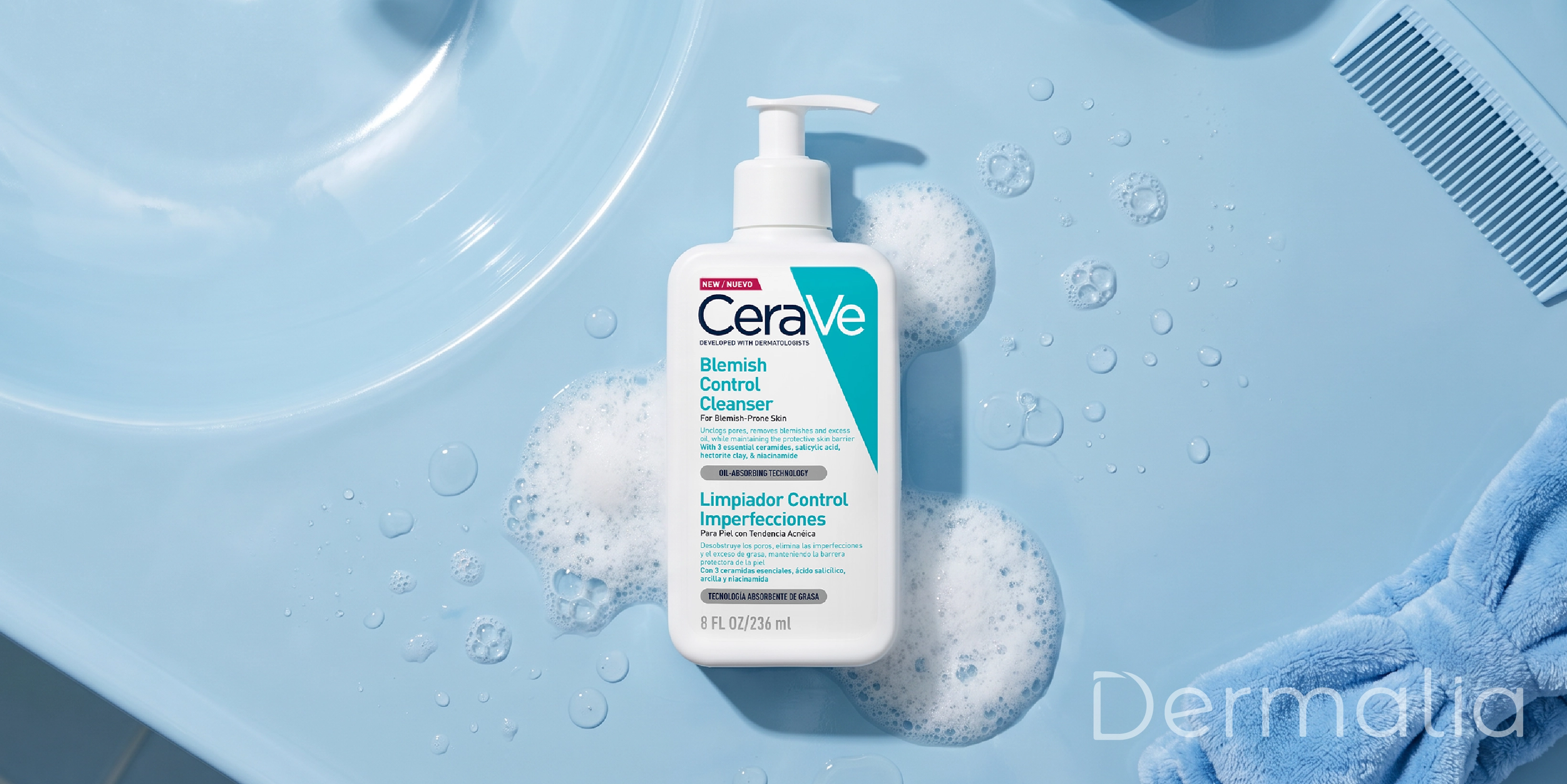 Limpiador facial para piel grasa diseñado para controlar el brillo y las imperfecciones. Limpiador facial para piel grasa y con tendencia al acné colocado sobre un lavabo junto a espuma y accesorios de skincare.